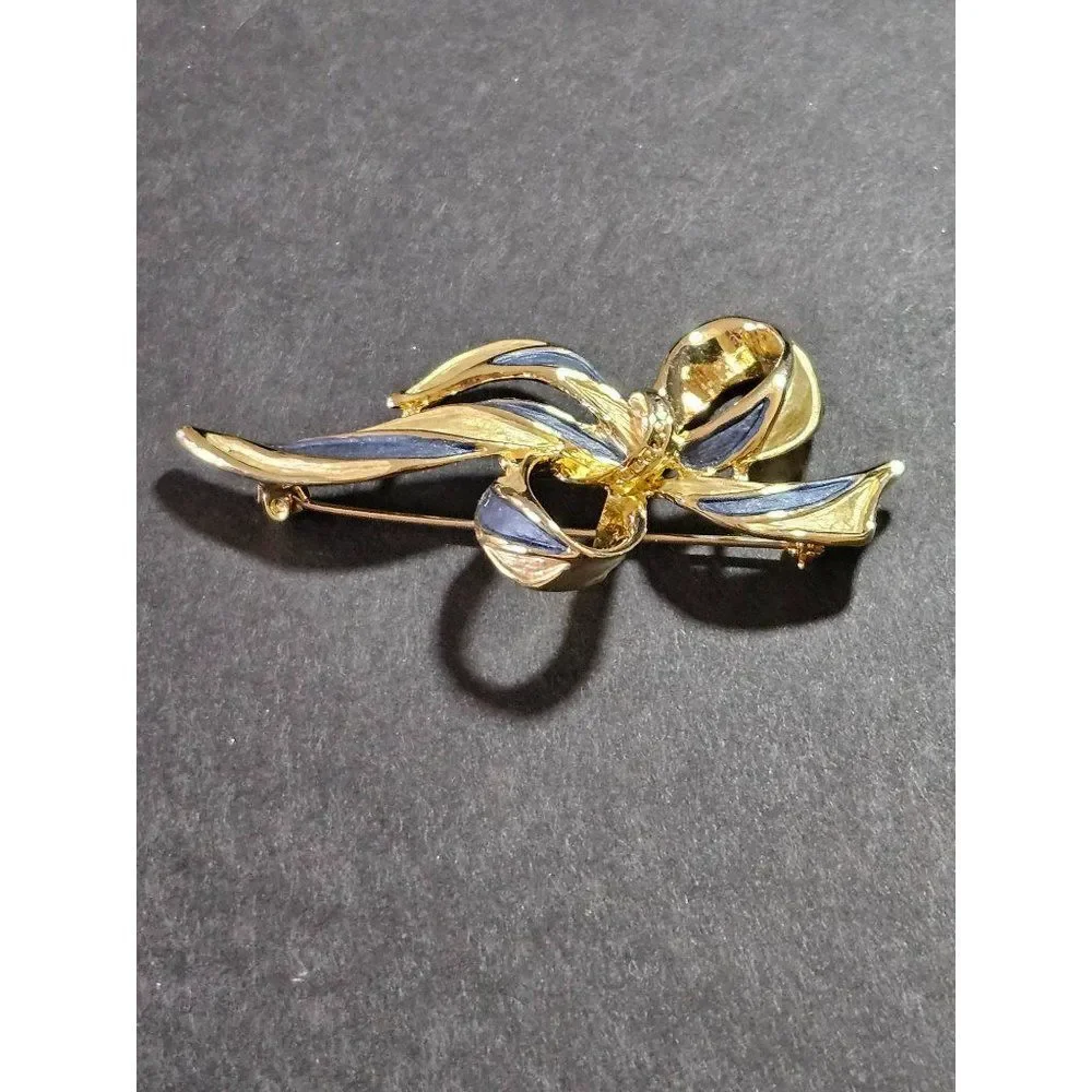 Vintage gold tone blue enamel bow brooch
